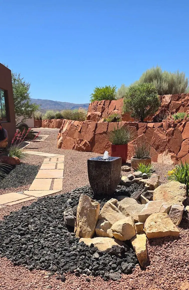 Single fountain within desert landscape