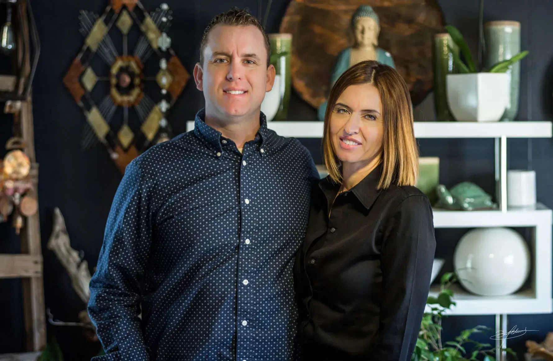 braden and nicole hancock smiling and standing together in our st george store