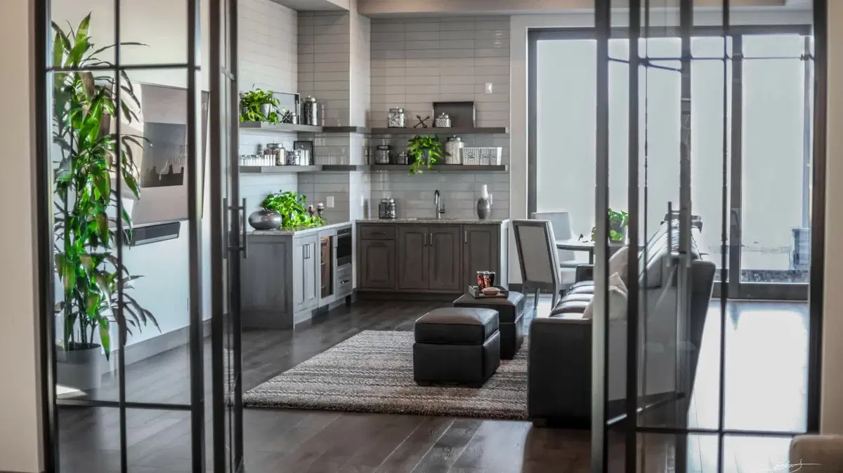 a gray-themed kitchen featuring tastefully placed planted pottery