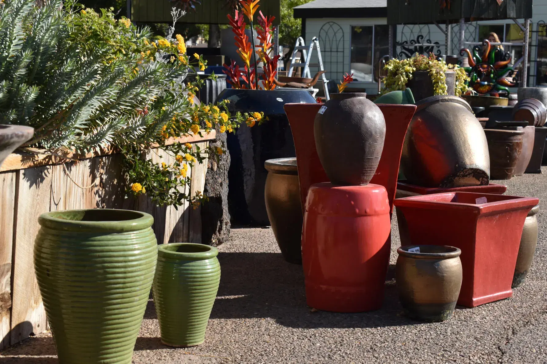 brown and red ceramic pottery display in our st george retail lot