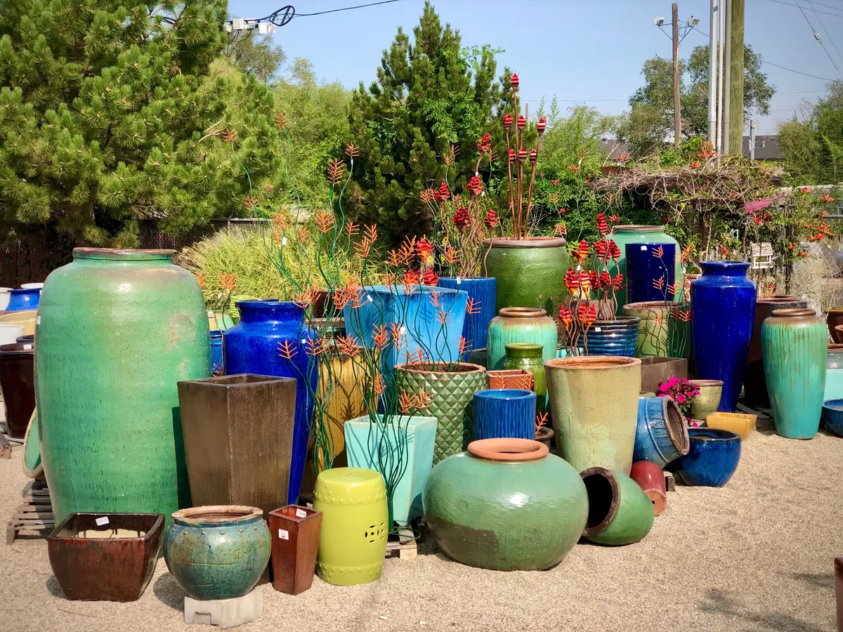 a specially curated collection of pottery, in green and blue tones